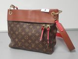louis vuitton cross body bag in brown and tan