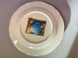 a white plate with a label on it on a table