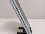 the back side of a tablet computer with a stand on top of it