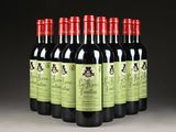 six bottles of red wine are lined up in a row