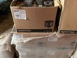 a pile of boxes sitting on top of a pile of bags
