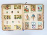 an open book with pictures of children on it