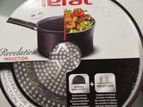 an image of a frying pan with a lid on a counter