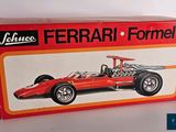 a box with a model of a racing car in it