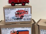 several boxes of toy trucks are stacked on top of each other