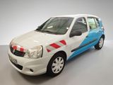 a picture of a small white car with a red and blue stripe on the side