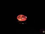 an image of a red diamond in the dark