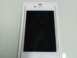 a white iphone sitting on top of a white box