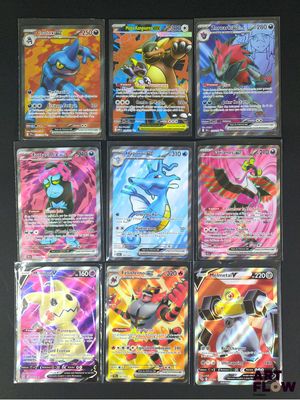 un groupe de cartes pokemon posées sur une table