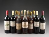 several bottles of wine are lined up in a row