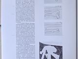 a book open to a page with drawings on it