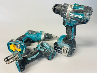 two makita cordless hammers and a cordless drill