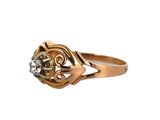 an image of a gold ring with a diamond in the center