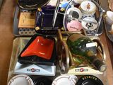 a table with a lot of dishes and cups on it
