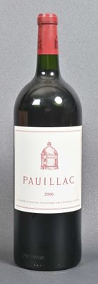 a bottle of wine that is sitting on a table