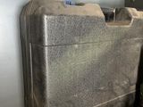 a suitcase that is sitting on top of a table