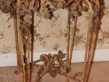 a small table with a marble top in a room