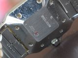 a close up of a wrist watch on a table