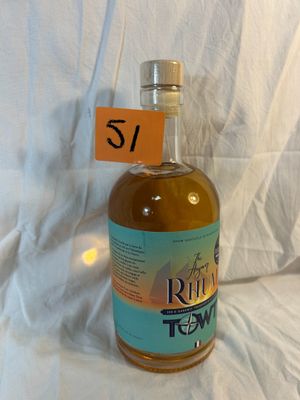 a bottle of rum that is sitting on a table