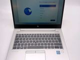 a laptop that is sitting on a white table