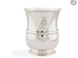 an image of a silver cup with a horse on it