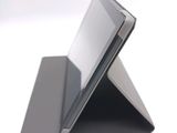 a tablet that is sitting on top of a stand
