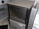 an image of a kitchen with a washing machine and a dryer