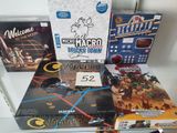 a lot of board games and games on the table