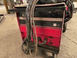 an image of a welding machine in a garage