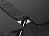 a black table with a black table top and a black table with a black table top and a black table with a black table top and a black table