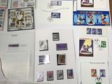 a lot of stamps and postcards on the table