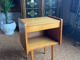 an image of a small wooden table with a shelf underneath it