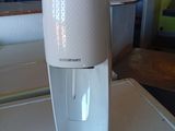 a water dispenser sitting on a counter in a kitchen