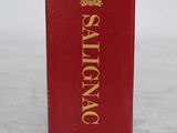 a close up of a red box on a table with a white background