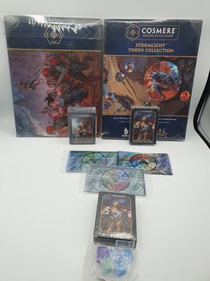 the contents of a game set including cards, tokens and cards