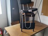 a chair that is sitting on a table in a room