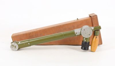 a small tool that is sitting on top of a piece of wood
