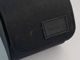 the case is black and has a leather label on it
