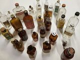a lot of bottles that are sitting on a table