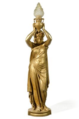 statue en or représentant une femme portant un pot sur la tête