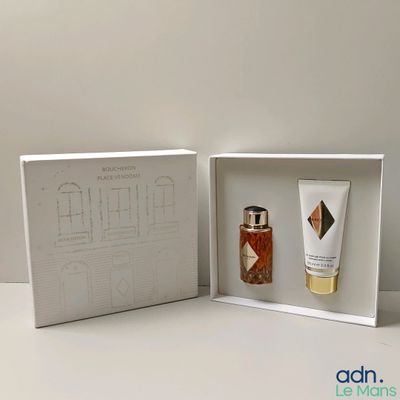 conception graphique d'un coffret de parfums présenté dans une boîte blanche