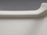 an image of a close up of a white vase on a table