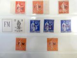 many different stamps on the wall in this picture