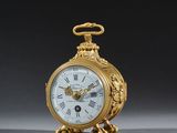 an image of a gold clock with roman numerals on the face