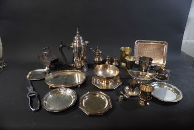 a lot of silver items on a black table