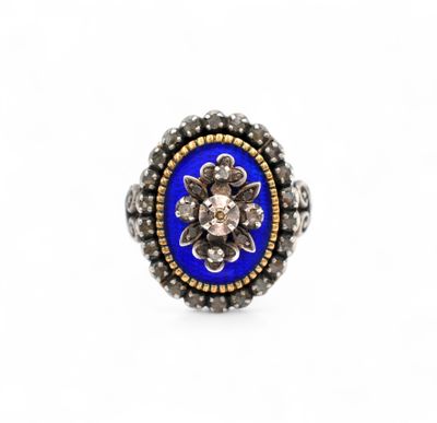 a close up of a ring on a white background