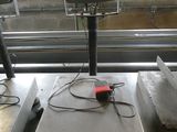 a scale that is sitting on a table in a room