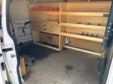 a white van that has some drawers in it