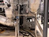 a large machine that is sitting inside of a building