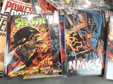 a lot of comic books sitting on a table